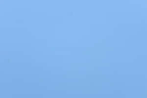 Ljusblå texturerad tygyta med subtila ojämnheter. — Blått ljus bakgrund Bakgrunder