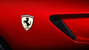 Ferrari-logo på rød bil med karbonfiberventil i nærheten