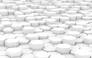 Un motif de blocs hexagonaux blancs avec des ombres douces et une faible profondeur de champ.
