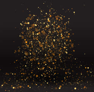 Golden sparkles burst against a black background for a festive luxury effect. — Sparkle Wallpaper