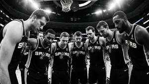 Black and white intense team huddle of the Spurs before a game
