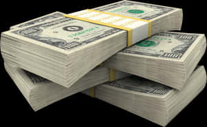 Stacks of one hundred dollar bills bundled and arranged in a pyramid shape.