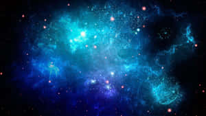 A glowing blue and teal nebula filled with stars in deep space. — Blue Space Picture