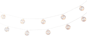 Two curved strings of glowing pearl lights against black background