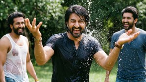 Salman Khan laughing and playing with water, outdoor summer fun with friends.