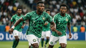 Dynamisk actionbillede af det nigerianske fodboldlandshold, Super Eagles, i en kamp