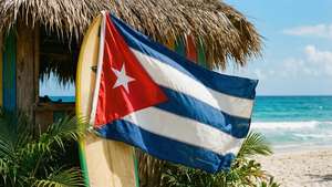 A Cuban flag displayed on a surfboard by a beach hut, perfect for a tropical wallpaper.