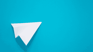 White paper airplane on turquoise background casting soft shadow — Telegram PNG