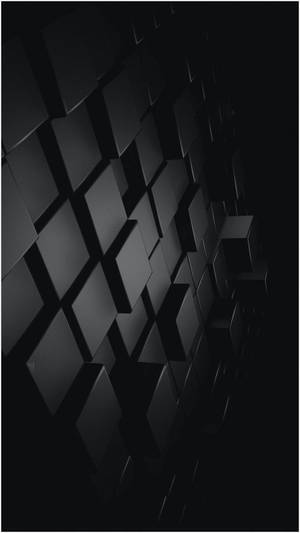 Abstract wall of black cubes in shadow with dramatic lighting. — Solid Black iPhone Picture