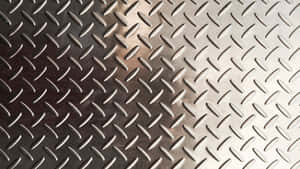 Närbild av diamantplåtmetalltextur med reflekterande silveryta. — Mörk textur bakgrund Bakgrunder