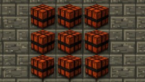 Pixel art grid of Minecraft TNT blocks.