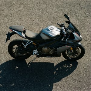 A top-down view of an Energica motorcycle on asphalt.