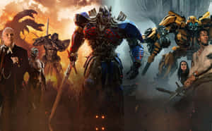 Transformers-robotar och människor i en brinnande strid med drakar. — Transformers Humla bilder Bakgrundsbilder