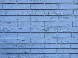 Blue painted brick wall with textured surface and chipped paint. — White Brick Wall Picture
