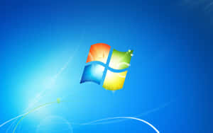 Windows-logotyp med färgglada paneler mot en blå gradientbakgrund med ljusstrimmor. — Windows 7 Bakgrundsbilder